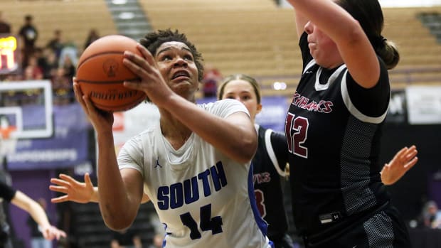 a South Medford Southridge 6A Oregon girls basketball quarterfinal 2024 Dan Brood 52